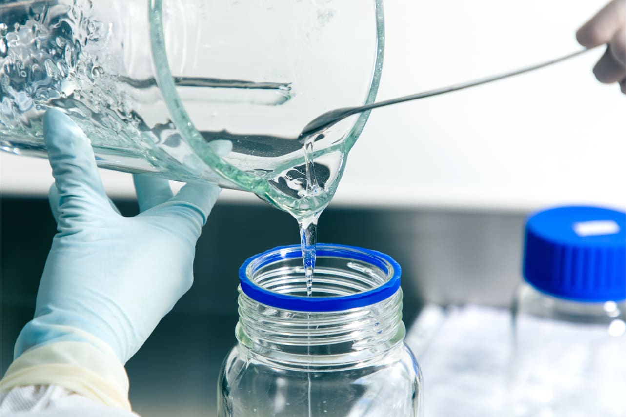 Italian laboratory researcher at microscope